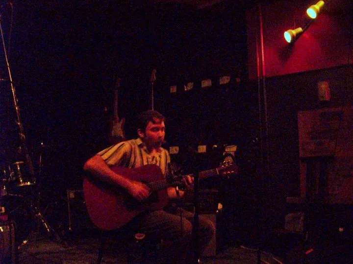 guitarist playing live